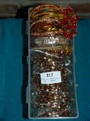 Box Containing 12 Packs of Asian Style Bracelets