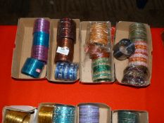 Four Boxes of Assorted Asian and Costume Bangles