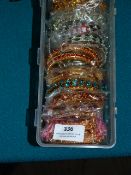 Box Containing Mixed Asian Style Bracelets