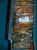 Box Containing 14 Packs of Asian Style Bracelets