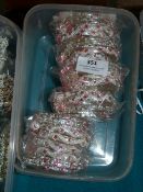 Box Containing 6 White Metal Asian Style Bracelets