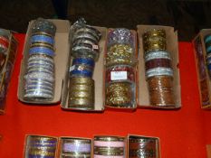 Four Boxes of Assorted Asian and Costume Bangles