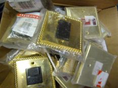 Box of Assorted Light Switches and Phone Sockets