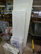 Four Radiators and a Toilet Cistern