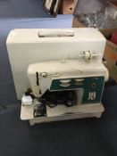 Cased Singer Electric Sewing Machine