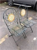 Two Folding Metal Chairs