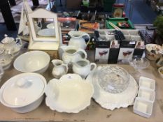 White Pottery Serving Bowls, Jugs and a Wooden Toi