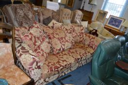 Purple Floral Patterned Sofa with Loose Cushions