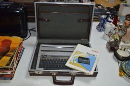 Attache Case Containing Canon Typestar 7 Personal