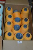 Twelve Cones of Gold Polyester Thread