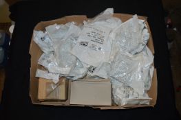 Box Containing Mixed White Eyelets