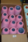 Twelve Cones of Pink Polyester Thread