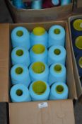 Twelve Cones of Turquoise Polyester Thread