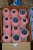 Eleven Cones of Pink Polyester Thread