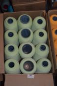 Twelve Cones of Pale Green Polyester Thread