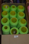 Twelve Cones of Green Polyester Thread
