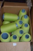 Twelve Cones of Lime Green Polyester Thread