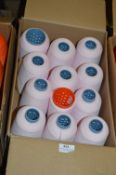 Twelve Cones of Pink Polyester Thread