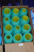 Twelve Cones of Emerald Green Polyester Thread