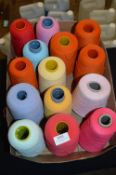 Fourteen Cones of Assorted Polyester Threads