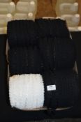 Five Rolls of Black and a Roll of White Lace Lingerie Trim