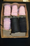 Two Rolls of Black and Three Rolls of Pink Lace Trim