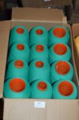 Twelve Cones of Emerald Green Polyester Thread