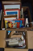 Two Boxes Containing Framed Prints, Books, Silver