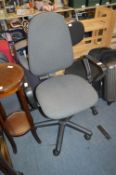 Grey Upholstered Swivel Office Armchair