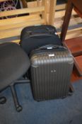 Two Pull Along Suitcases