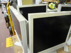 Two Flexscan and One Fujitsu Computer Monitors