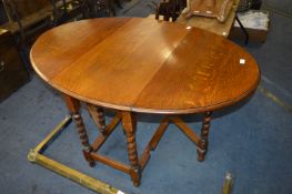 Oak Oval Topped Barley Twist Gate Leg Dining Table