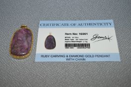 18cT Yellow Gold Ruby Carving and Diamond Pendant