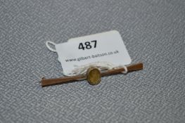 9cT Gold Tie Pin with Yellow Stone