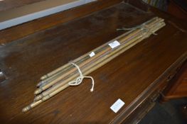 Set of Fourteen Brass Stir Rods