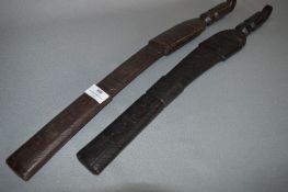 Pair of Middle Eastern Decorative Leather Cased Swords