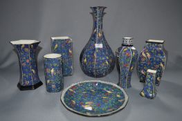 Eight Royal Doulton Floral with Bird Decoration Vases