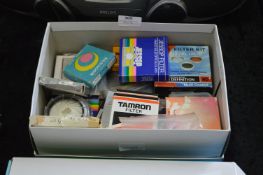 Box Containing a Quantity of Camera Filter Lenses