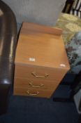 Beech Three Drawer Bedside Cabinet