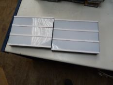 Two Illuminated Signs