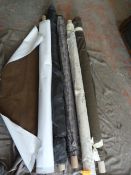 *Five Rolls of Fabric