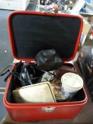 Cosmetics Case Containing Vintage Cameras and Deco