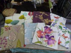 *Eight Unframed Fabric Prints