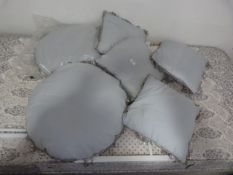 *Five Blue Cushions with Bejeweled Edging