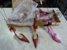 *Two Boxes of Decorative Shoes