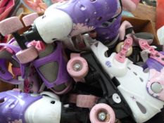 Two Toy Buggies and Two Toy Baby Carriers