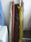 *Five Small Rolls of Fabric