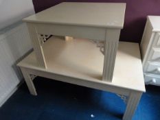 Two Cream Coloured Tables