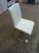 *Four White Polyurethane Chairs