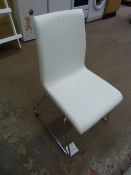 *Four White Polyurethane Chairs